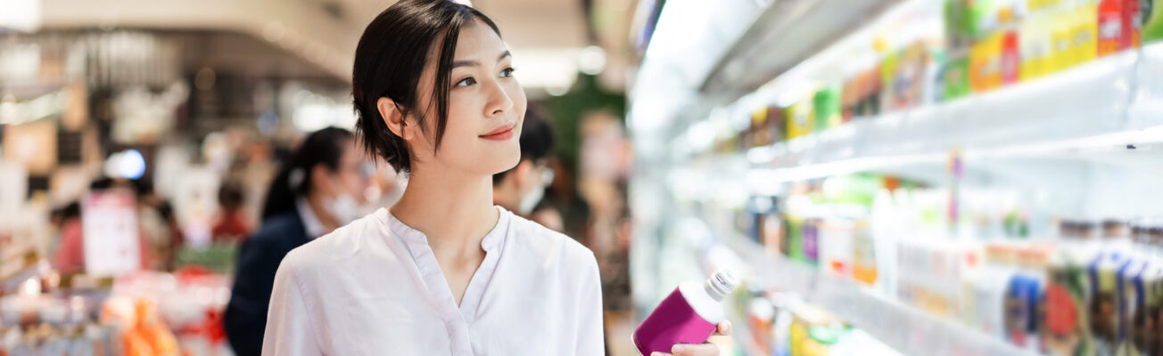 Asian woman going to the supermarket to buy supplies